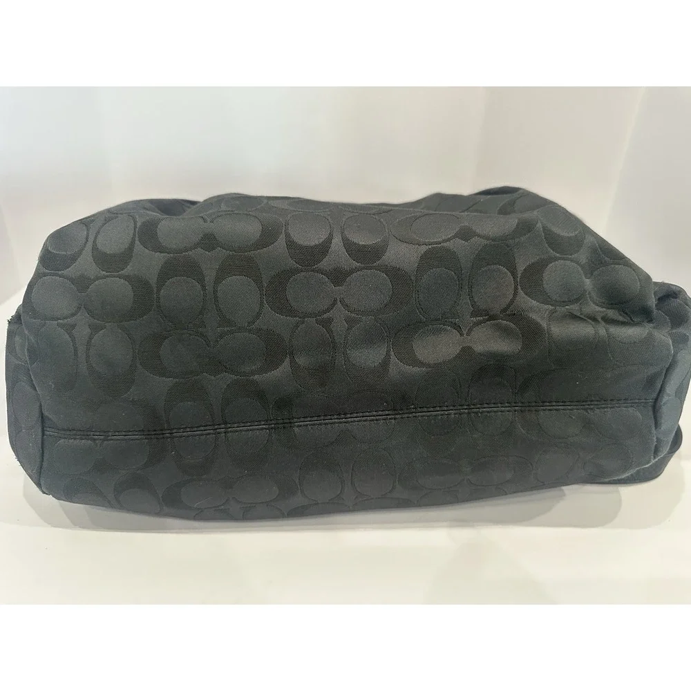 Coach black signature